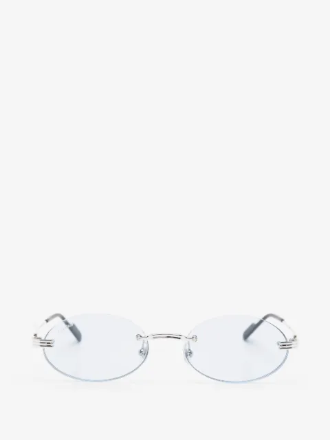 Cartier Eyewear солнцезащитные очки в безободковой овальной оправе