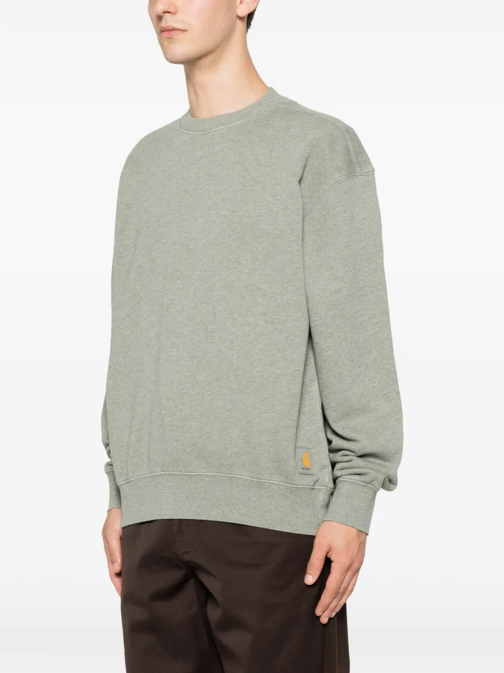 Carhartt WIP Caspian sweater met logopatch Groen