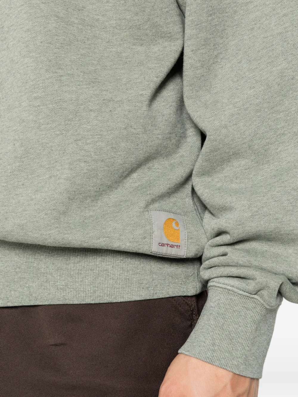 Carhartt WIP Caspian sweater met logopatch Groen