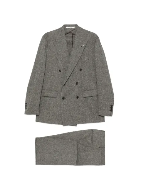 Tagliatore traje con doble botonadura