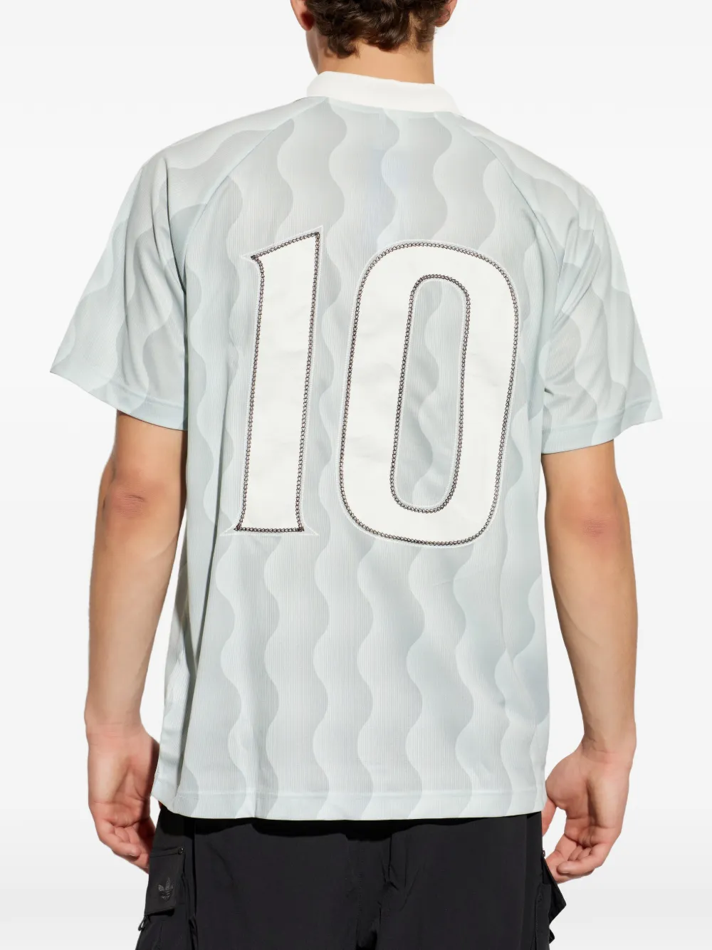 adidas Poloshirt met geborduurd logo en golvend patroon Groen