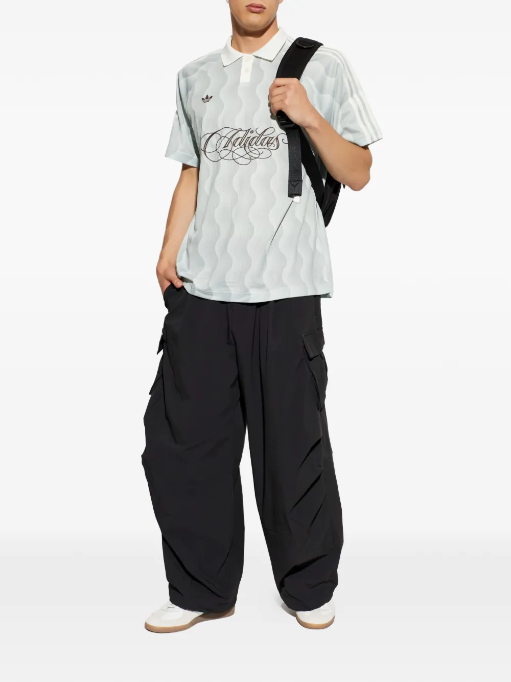 adidas Poloshirt met geborduurd logo en golvend patroon Groen
