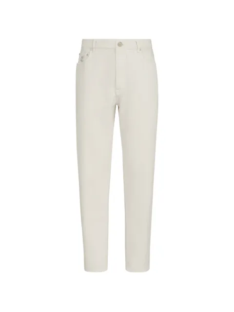 Brunello Cucinelli garment-dyed denim iconic fit five-pocket trousers with rips