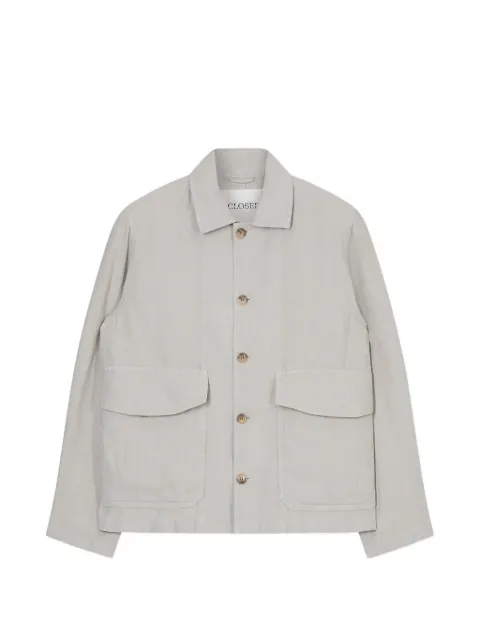 Closed button-fastening flap-pocket jacket