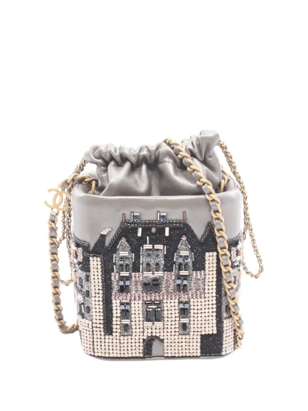 Chanel Pre-owned 2021 Metallic Lambskin Crystal Metiers D Art Chateau De Chenonceau Bucket Bag in Silver