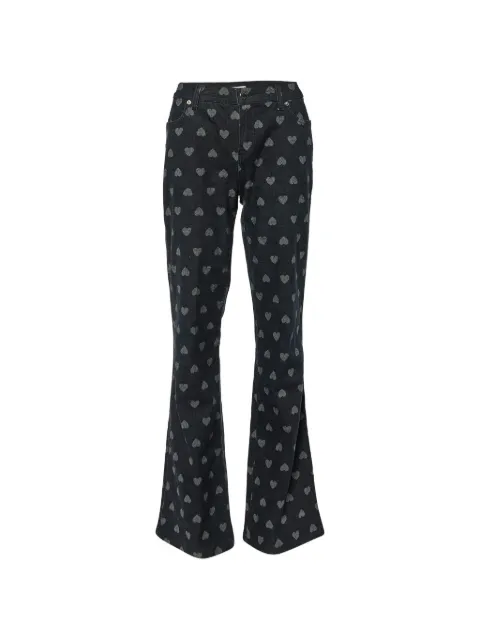 Moschino Pre-Owned jean évasé à motif cœur
