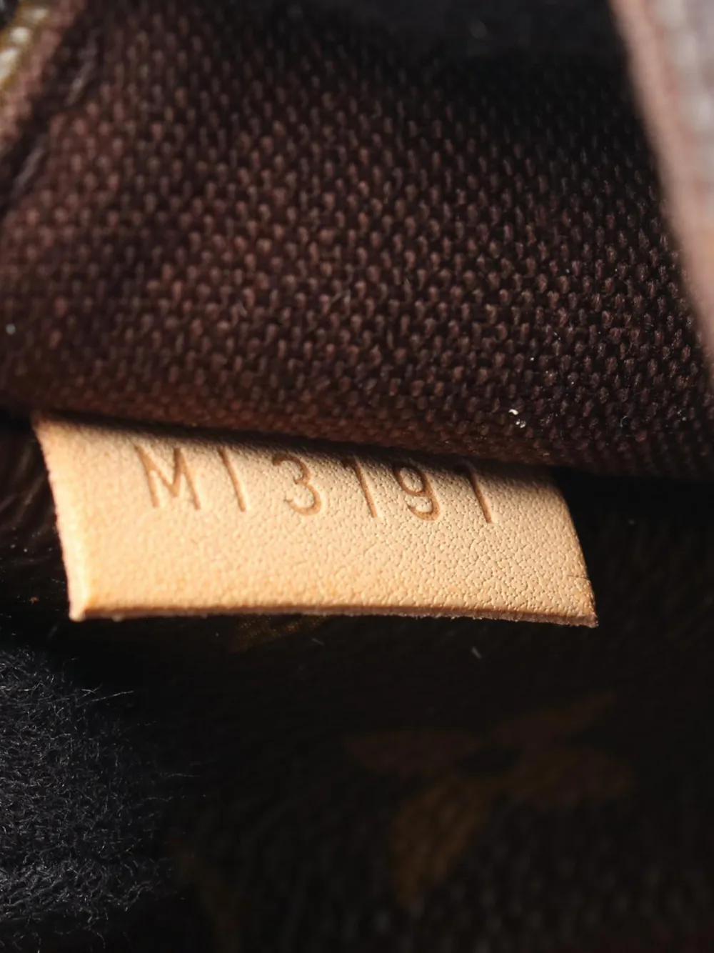 Louis Vuitton Pre-owned 2011 Monogram Menilmontant MM Crossbody Bag in Brown, view 2