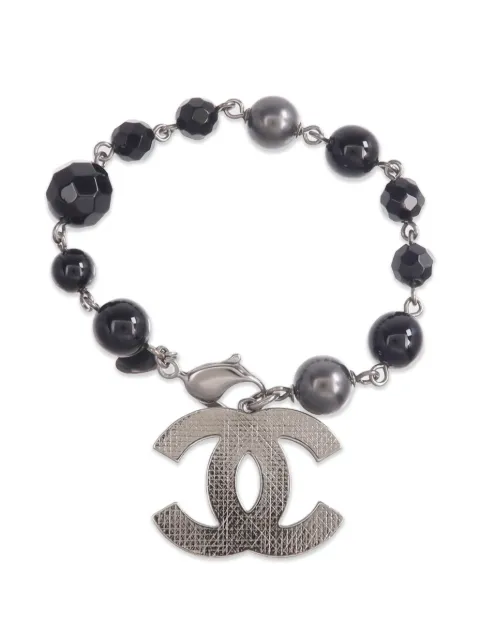 CHANEL Pre-Owned pulsera con cuentas y logo CC