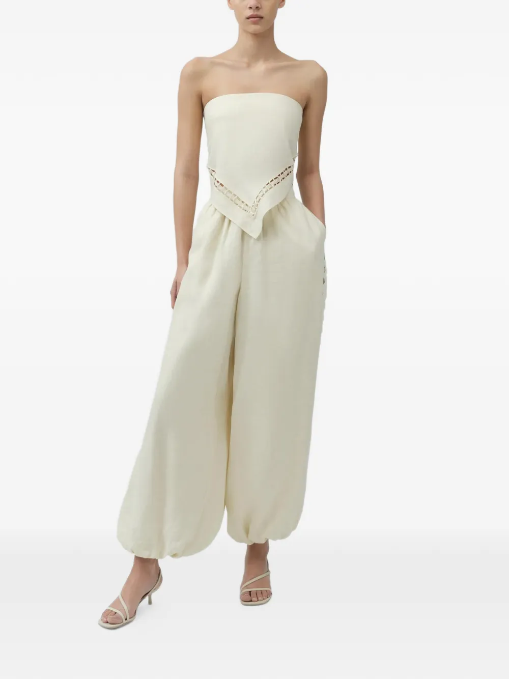 SIMKHAI Lahni strapless top met uitgesneden details Beige