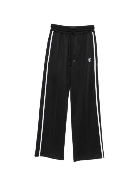 AMIRI pants con rayas laterales