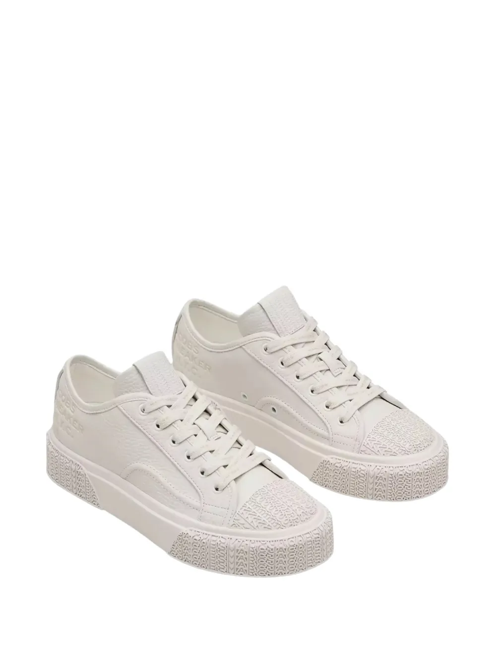 Marc Jacobs Sneakers van bewerkt leer met logo-reliëf Beige