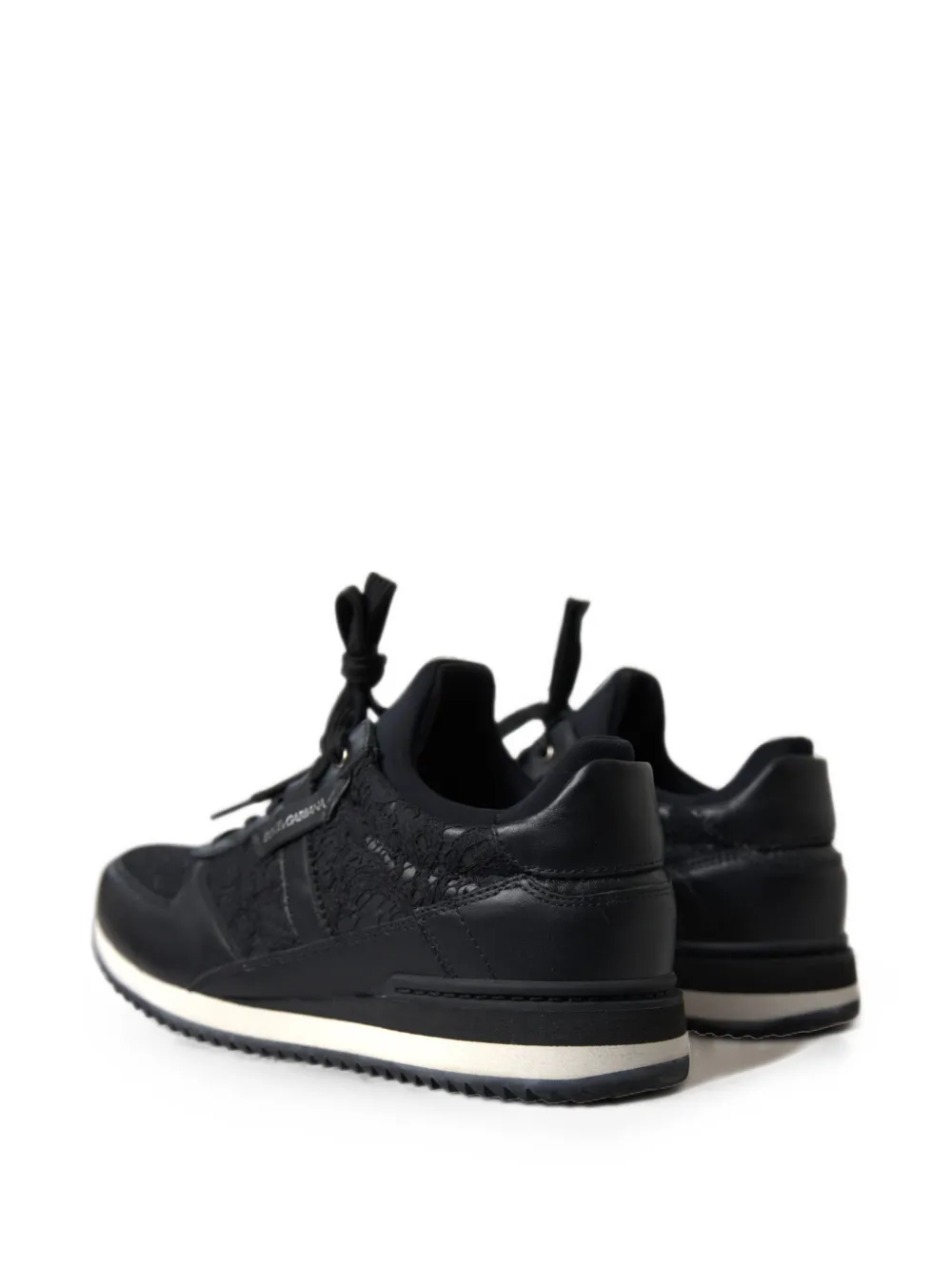 Dolce & Gabbana Leren sneakers met overslag van kant Zwart