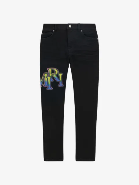 AMIRI Staggered logo-print jeans
