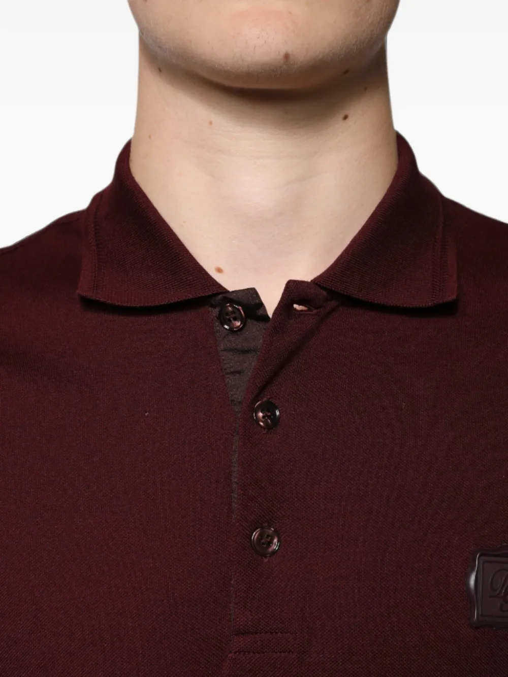Dolce & Gabbana Piqué poloshirt met leren patch en katoenen print Bruin