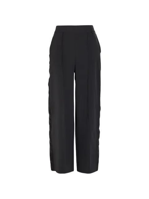 Nike pantalon plissé à rayures latérales