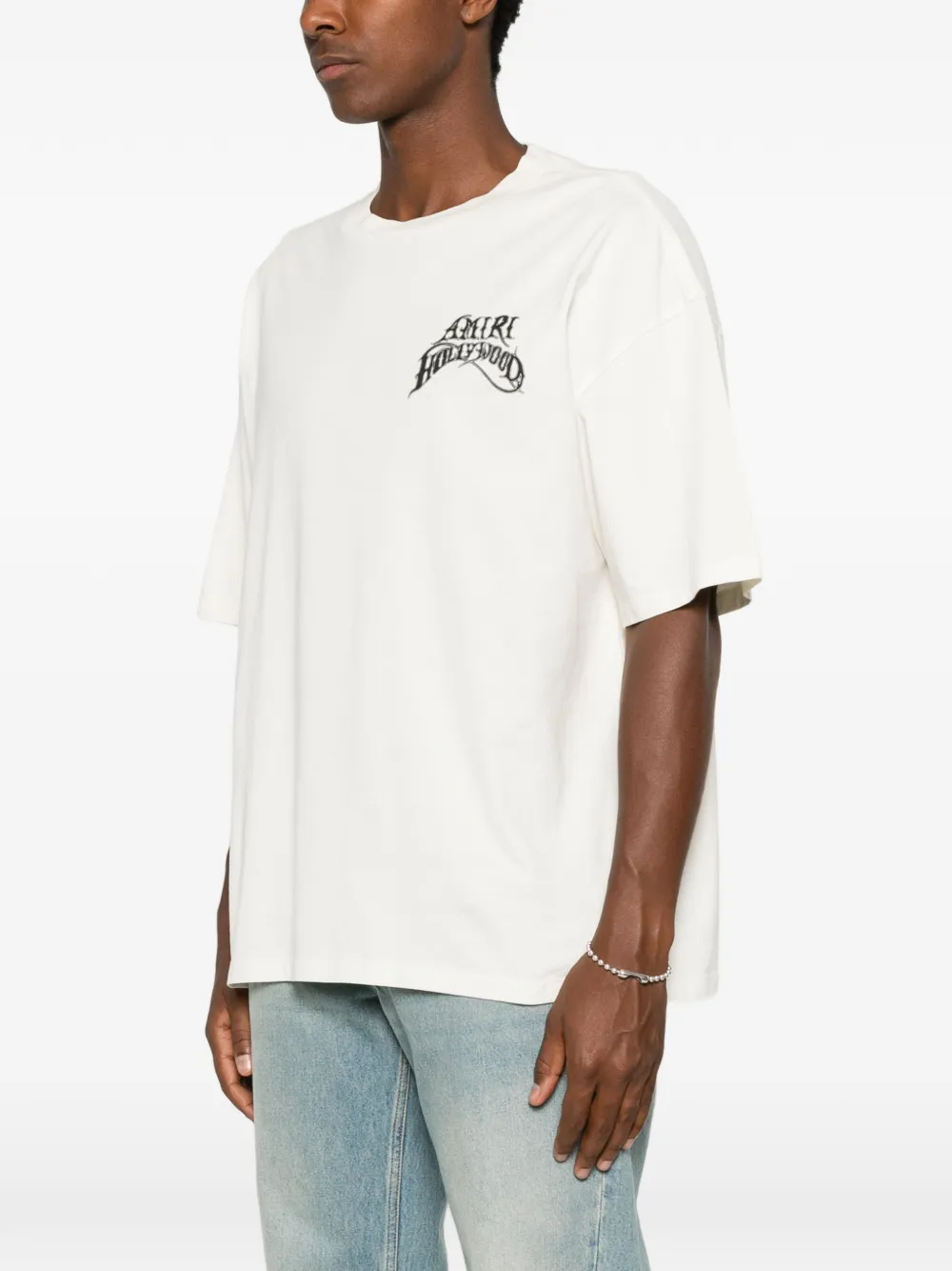 AMIRI T-shirt met logoprint Beige
