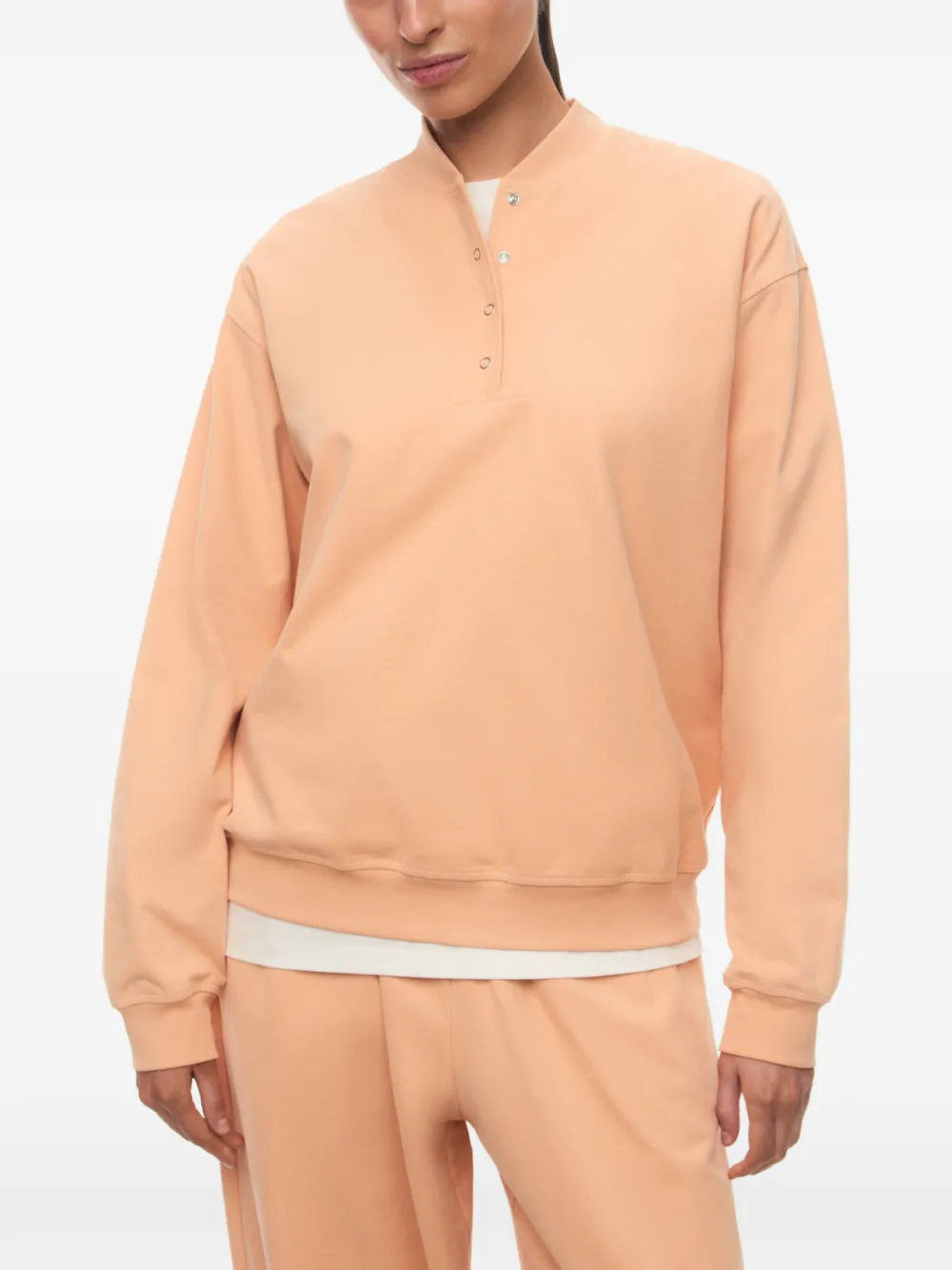 12 STOREEZ Breakfast Club sweater met drukknoop Oranje