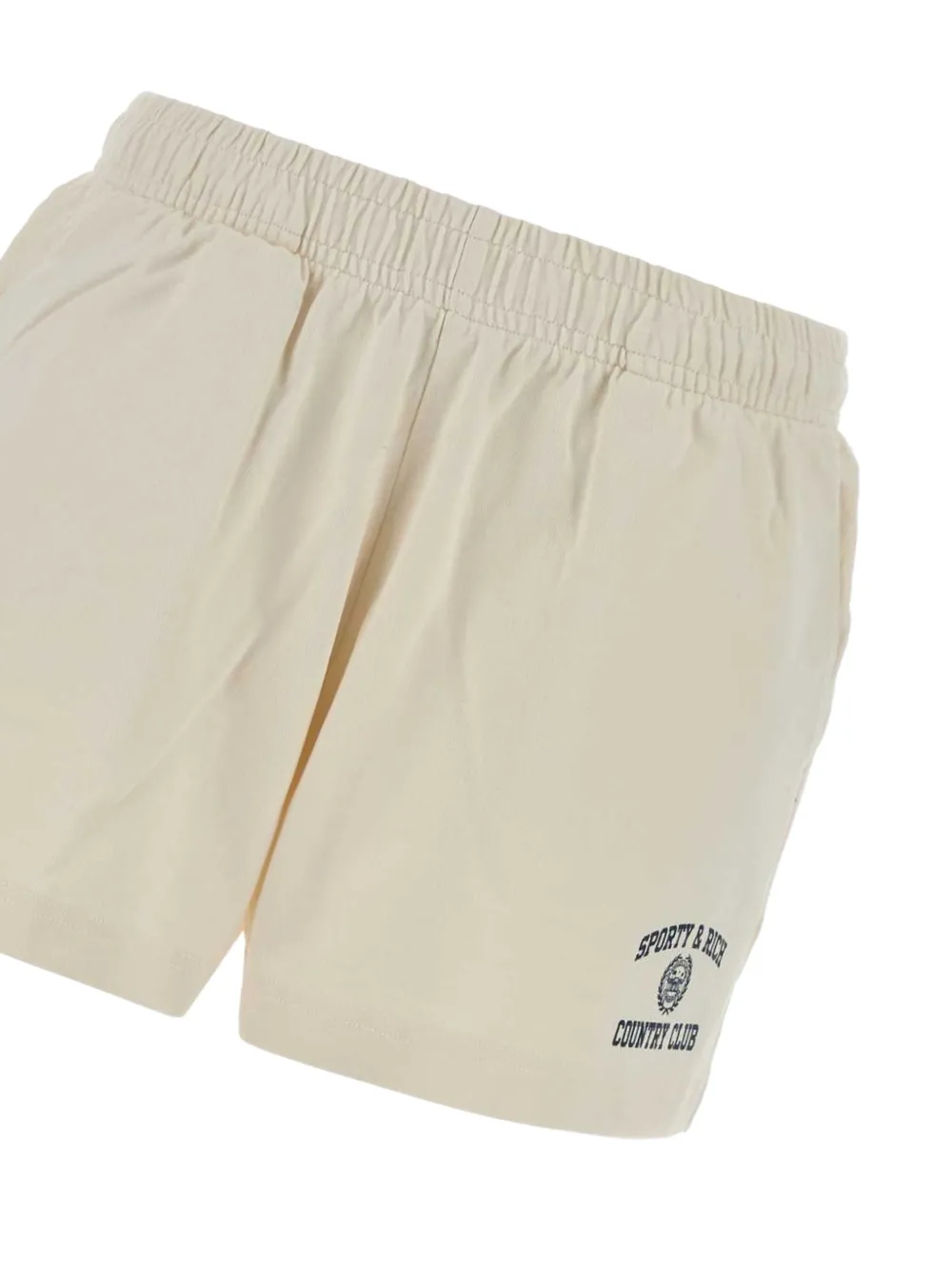 Sporty & Rich Varsity katoenen shorts met wapenschildprint Beige