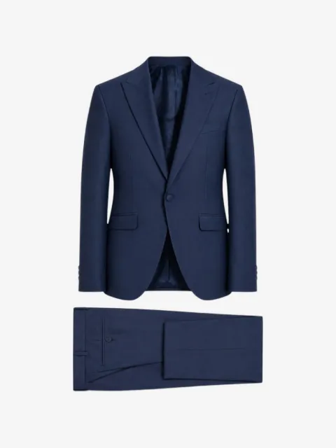 ETIEM TEXTIL S.L. traje con botones y solapas de pico