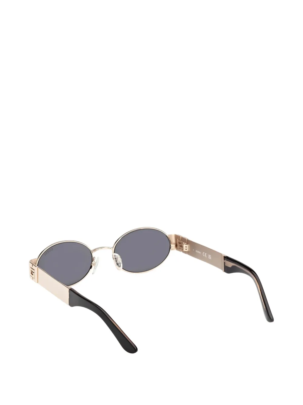 GUESS EYEWEAR Zonnebril met ovalen montuur Goud