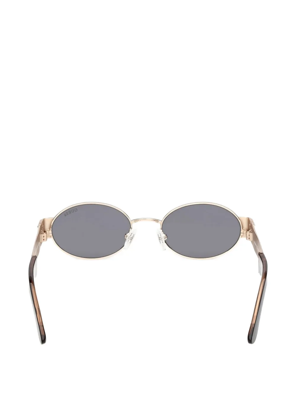 GUESS EYEWEAR Zonnebril met ovalen montuur Goud