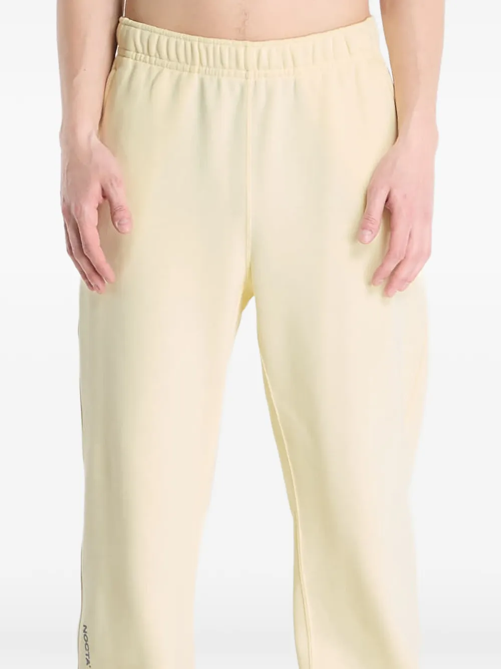 Nike x NOCTA trainingsbroek met open afwerking Beige