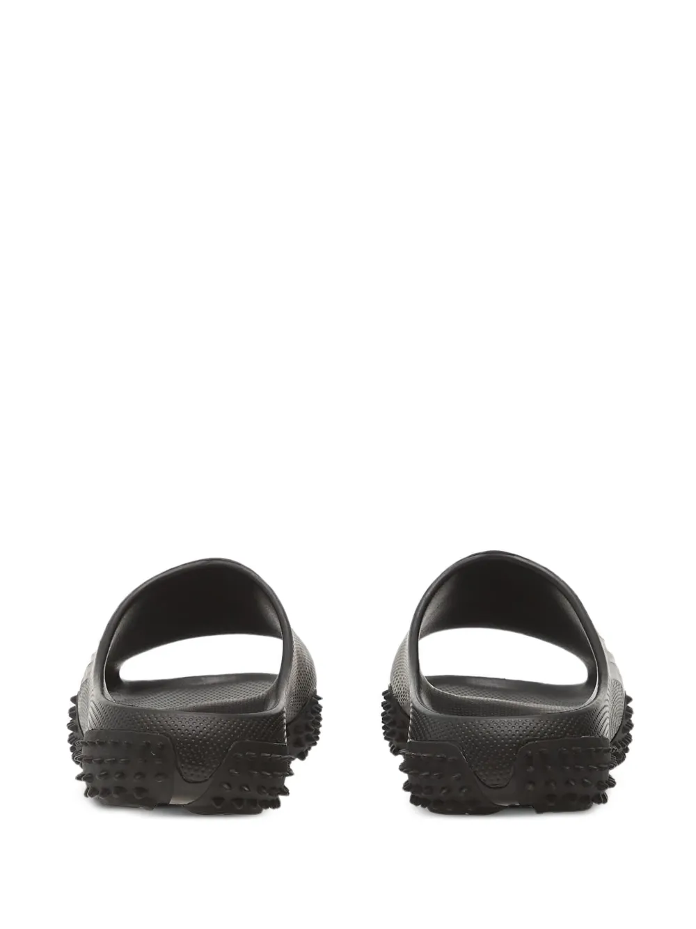 PUMA Mostro slippers met logo-reliëf Zwart