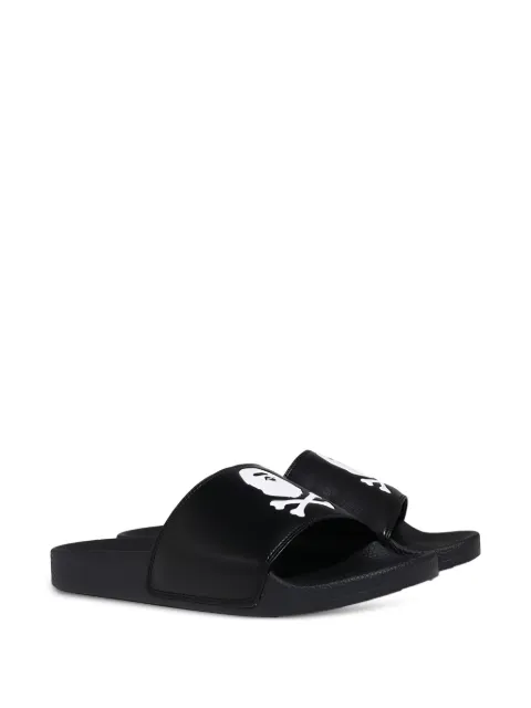 A BATHING APE® Crossbone flat slides