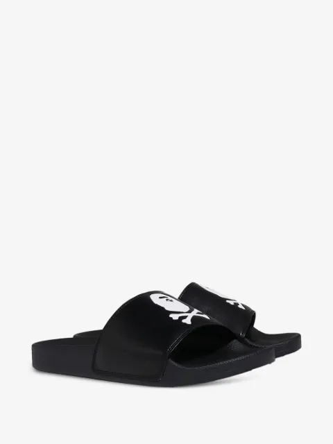 A BATHING APE® Crossbone flat slides