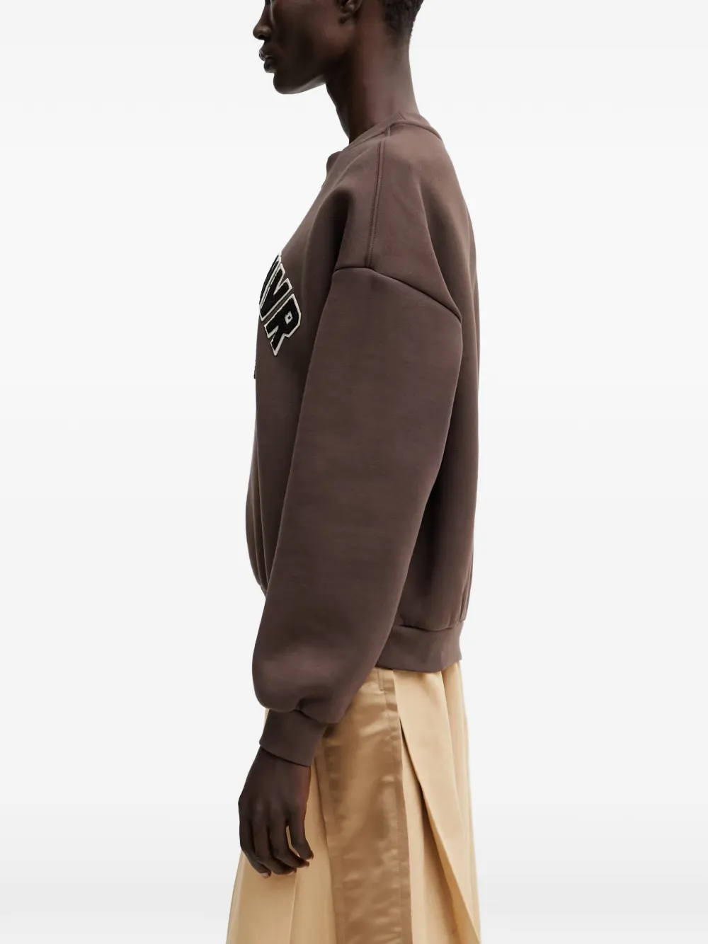 WRSTBHVR Matteo sweater met logo-patch Bruin