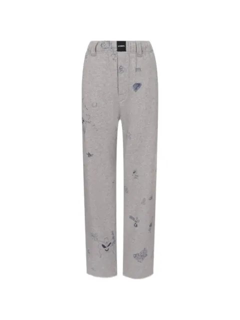 VETEMENTS scribble-print trousers