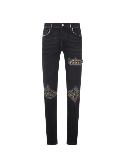 AMIRI vaqueros skinny envejecidos con apliques