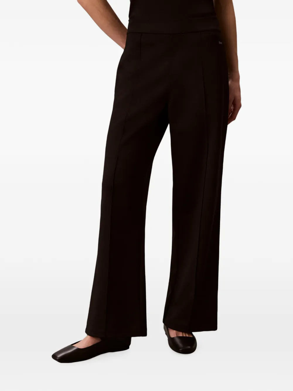 Calvin Klein logo-plaque wide-leg trousers - Marrone