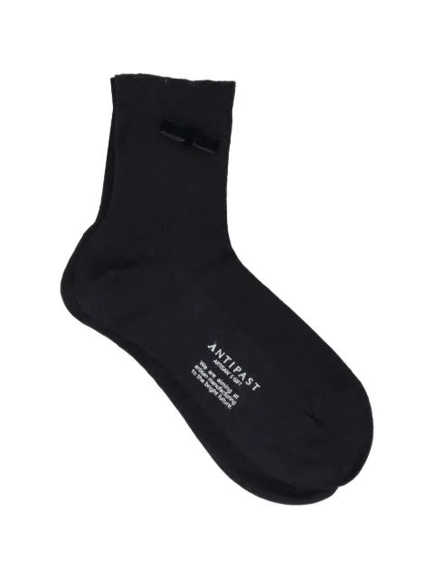 Antipast calcetines con moño de terciopelo y motivo de lunares