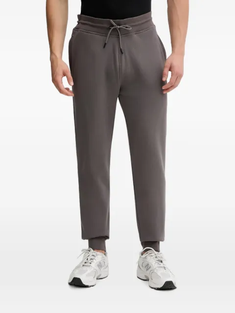 GUESS USA logo-patch drawstring track pants