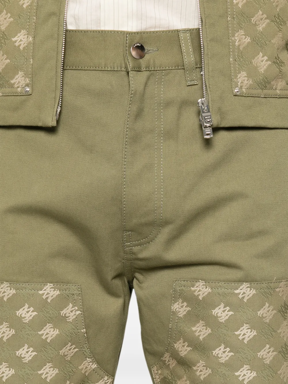 AMIRI Broek met monogram-patroon en vlakken Groen