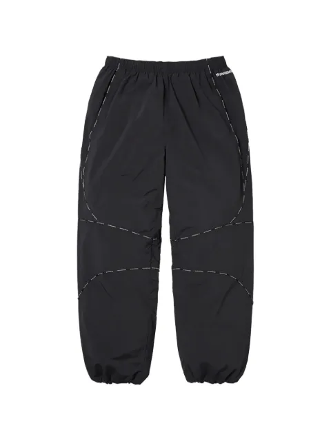 Supreme logo-piping track pants