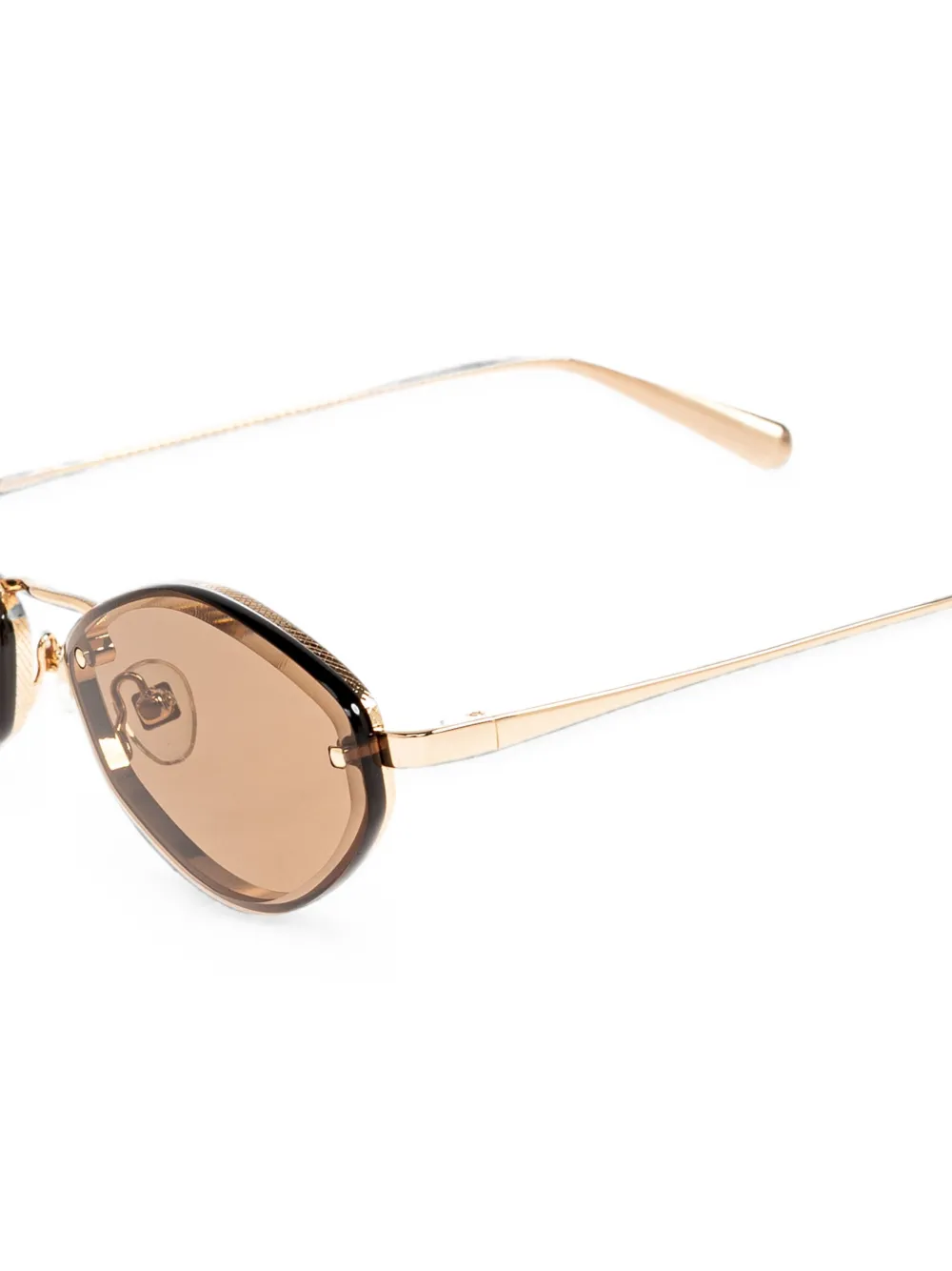 Jacquemus Zonnebril met geometrisch montuur Goud