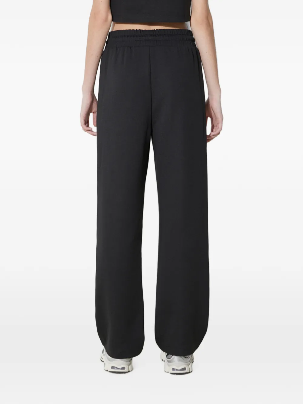 PUMA Trainingsbroek met geborduurd logo Zwart