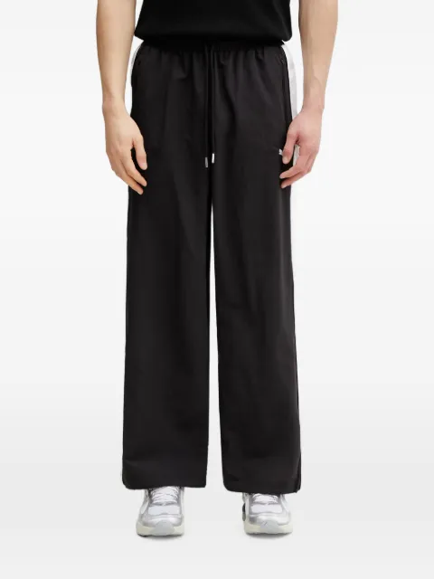 PUMA T7 logo-print side-stripe track pants