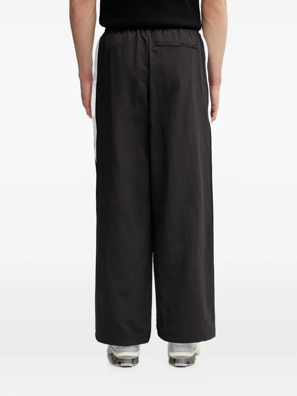 PUMA T7 logo-print side-stripe track pants Zwart