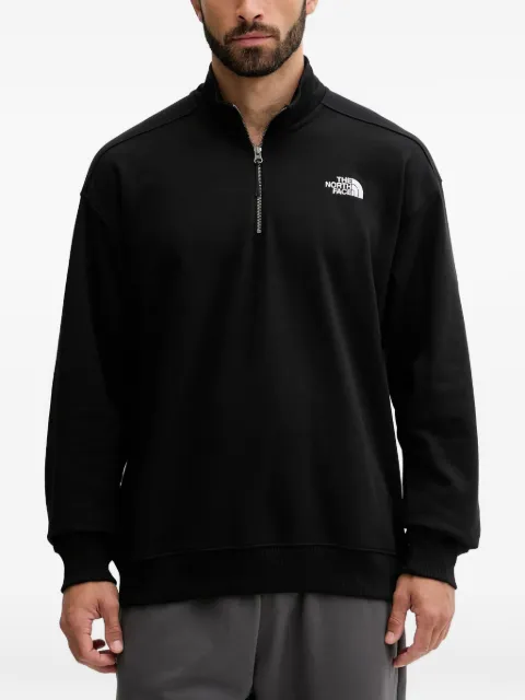 The North Face pull col zippé à logo brodé