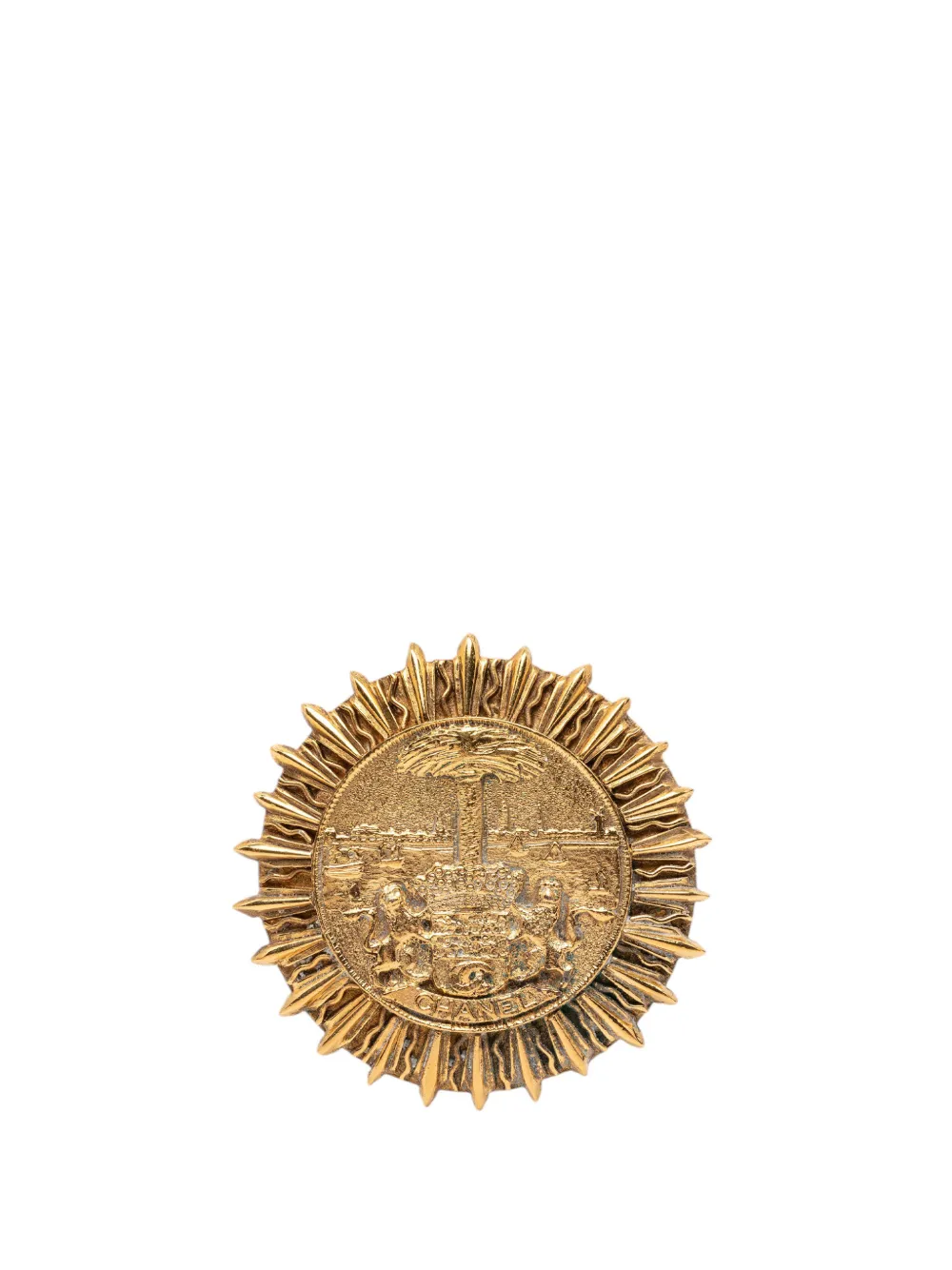 CHANEL Pre-Owned 1970-1980 Gold Plated Coat Of Arms Medallion Sunburst Brooch costume brooch - Oro