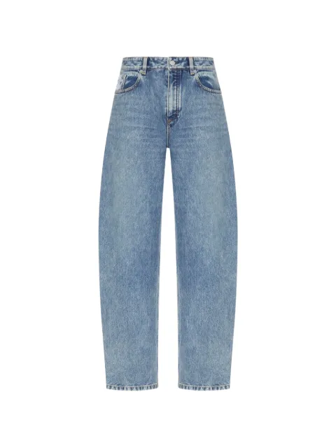 Alaïa faded-effect curved-leg jeans