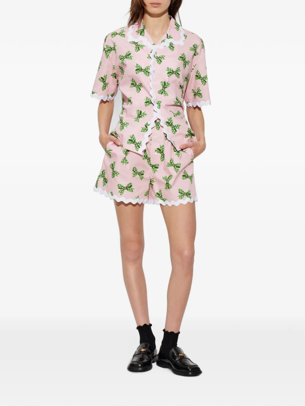 Moschino Shorts met gewelfde afwerking en strikprint Roze