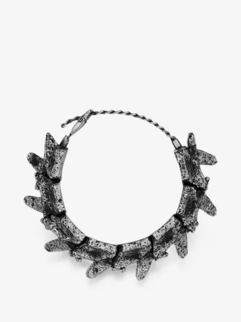 Diesel pulsera con componentes en tono plateado