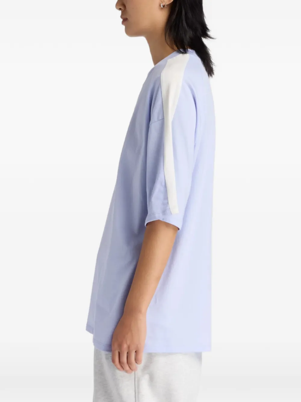 New Balance Trackside oversized T-shirt Paars