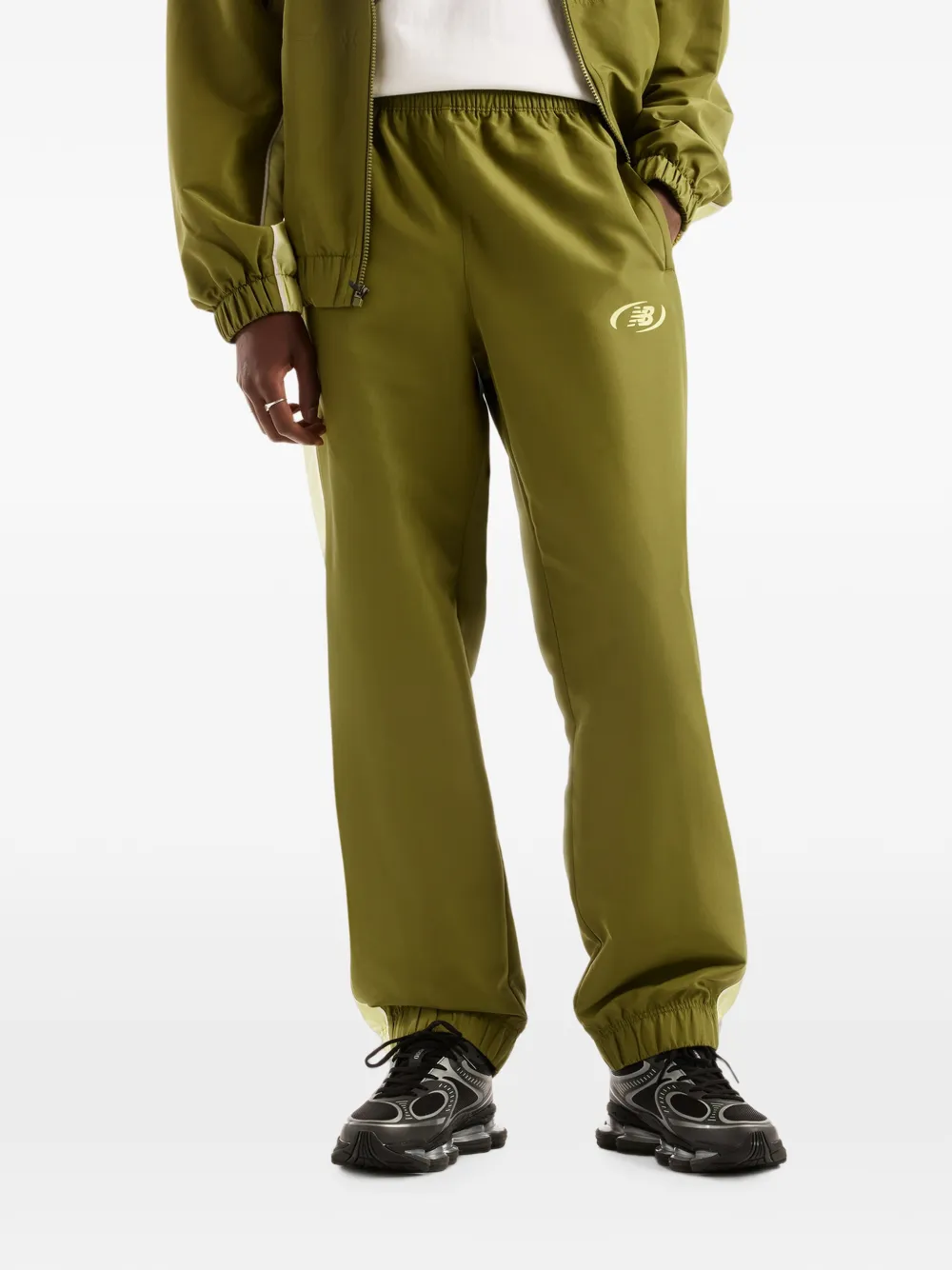 New Balance Trackside geweven broek Groen