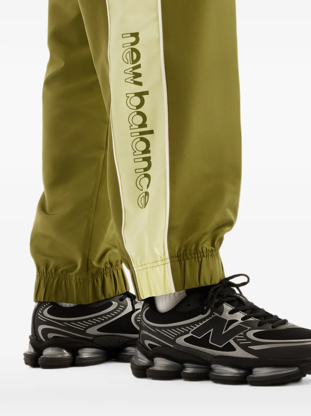New Balance Trackside geweven broek Groen