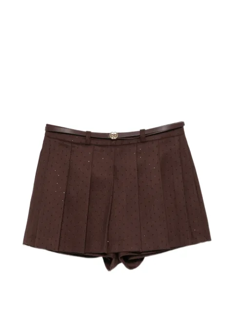 Maje pantalones cortos con cinturón